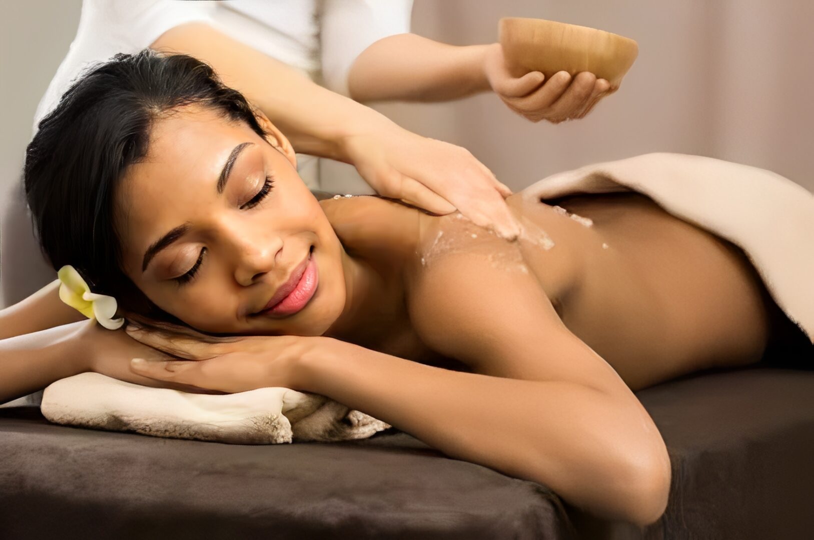 Woman enjoying a relaxing spa massage.