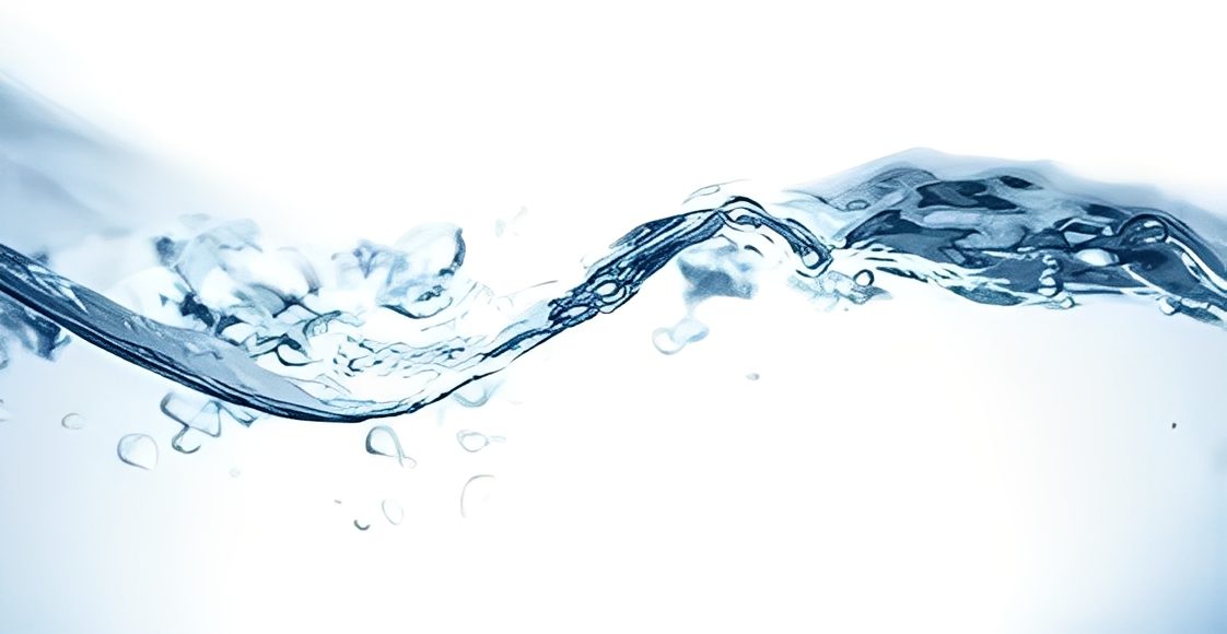 Clear water wave with bubbles and ripples.