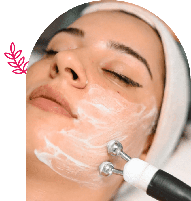 Microcurrent facial treatment on woman's cheek