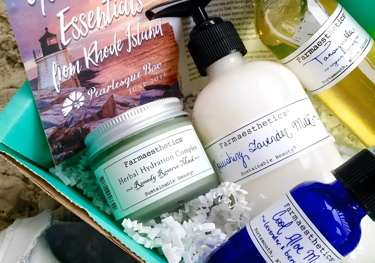 Skincare products in a summer essentials box.