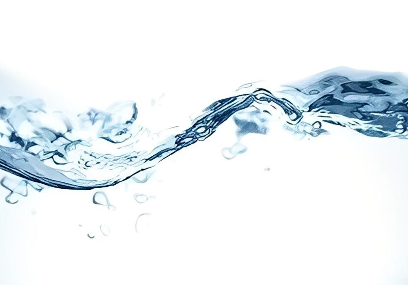 Clear water wave with bubbles and ripples.